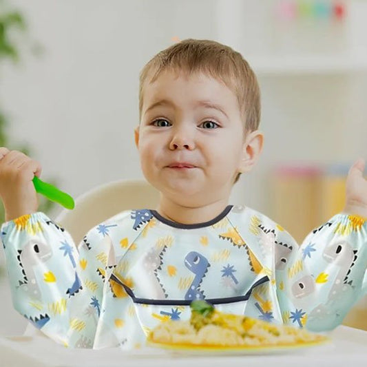 Bavoir manche longue motif dinosaure 