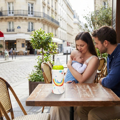 chauffe biberon portable à côté du maman
