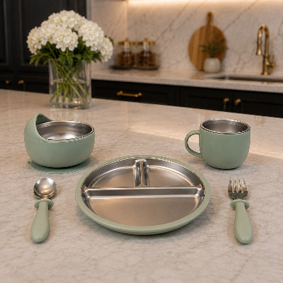 coffret bebe repas vert sur table