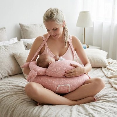 Coussin pour allaiter couleur rose ergonomique 