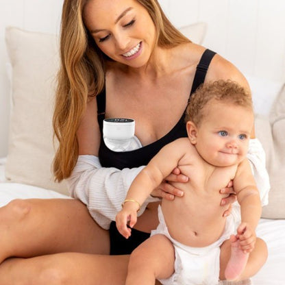 maman avec Tire lait main libre