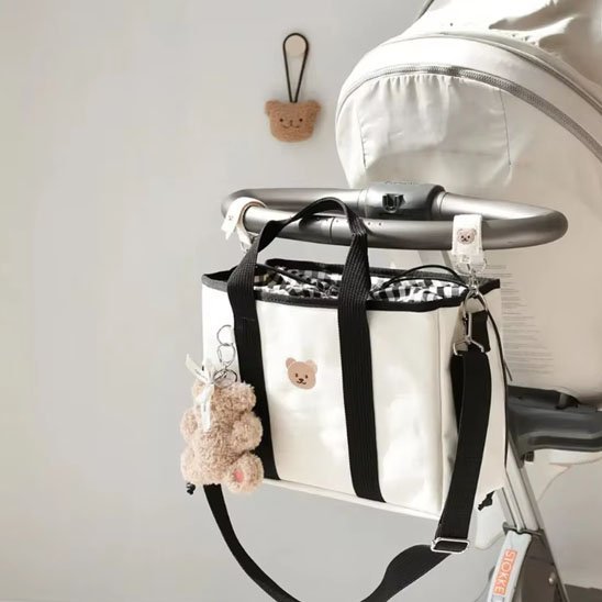Sac à langer noir avec attache poussette