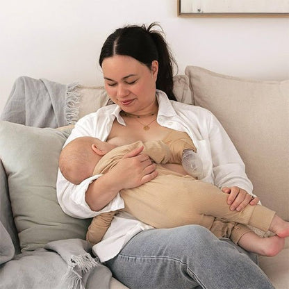 Tire lait manuel sur maman
