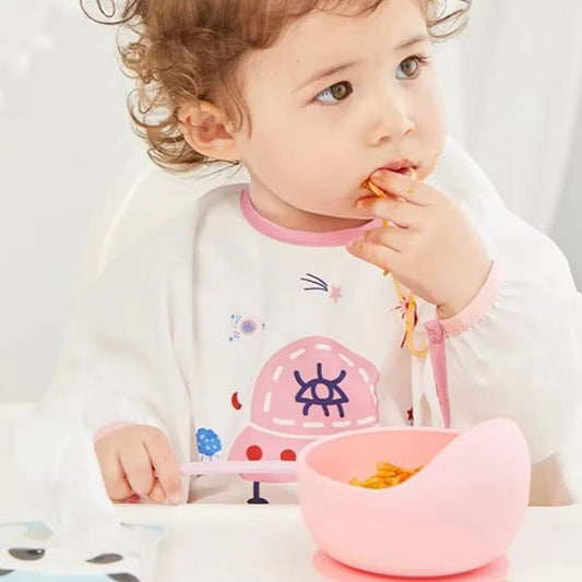 Une assiette bebe rose